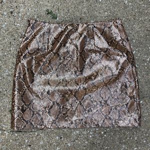 Faux leather snake print skirt from Akira!